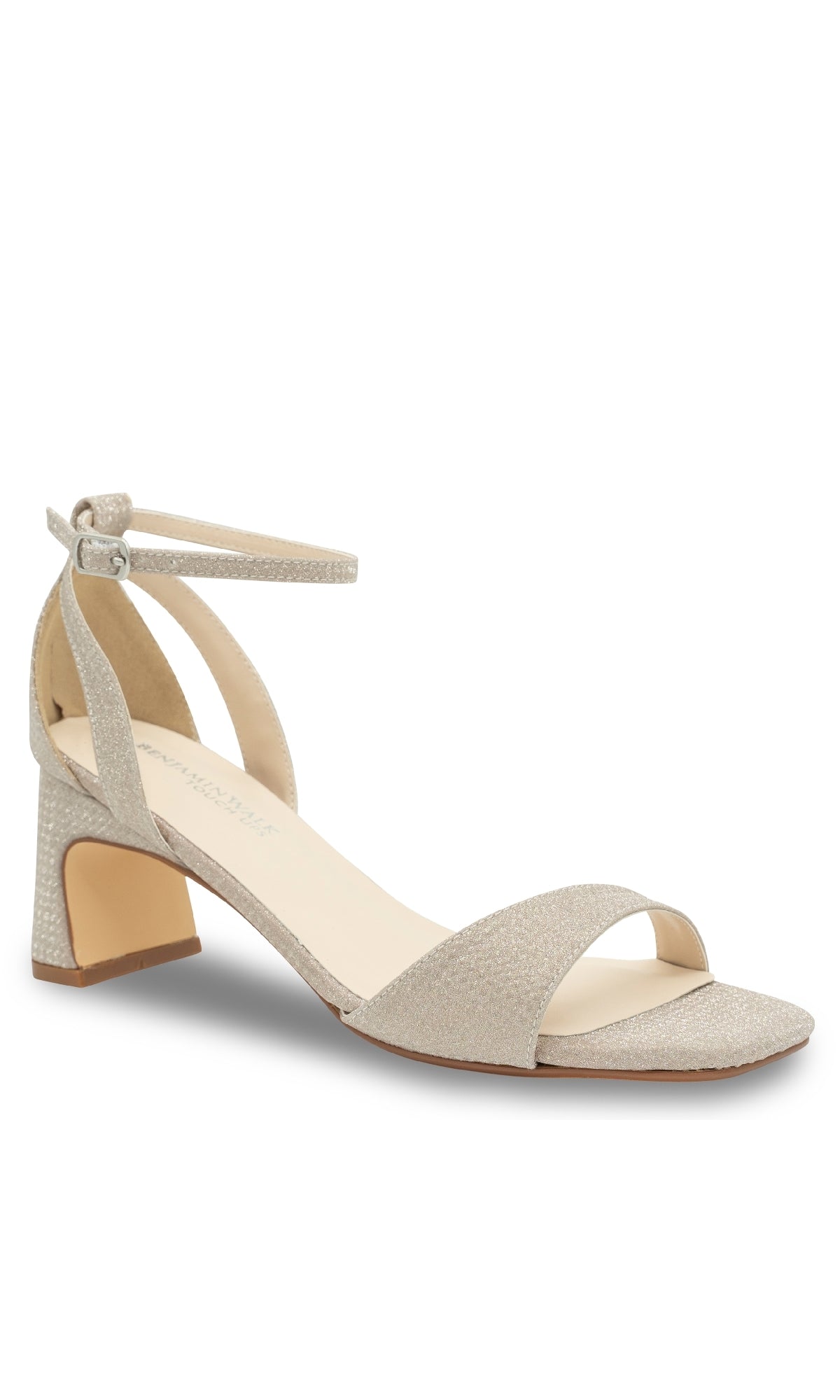 The Lilibet Champagne Prom Shoes: Touch Ups 4670 feature a single beige heeled sandal with an ankle strap, open toe, and low block heel, displayed on a white background—ideal elegant low-heel prom shoes.